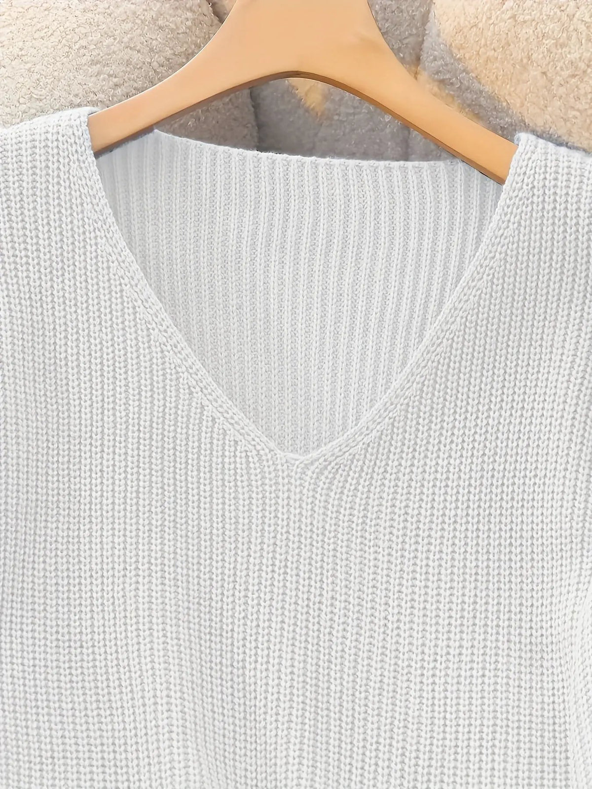 Women's Ribbed V-Neck Sweater with Button Cuffs by Bellmaren